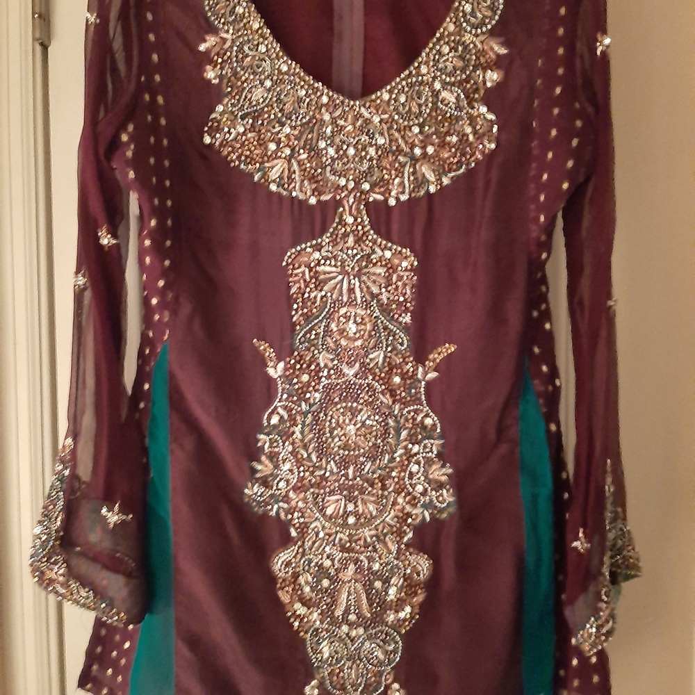 Middle Eastern Dress and brown pants with duppata.
